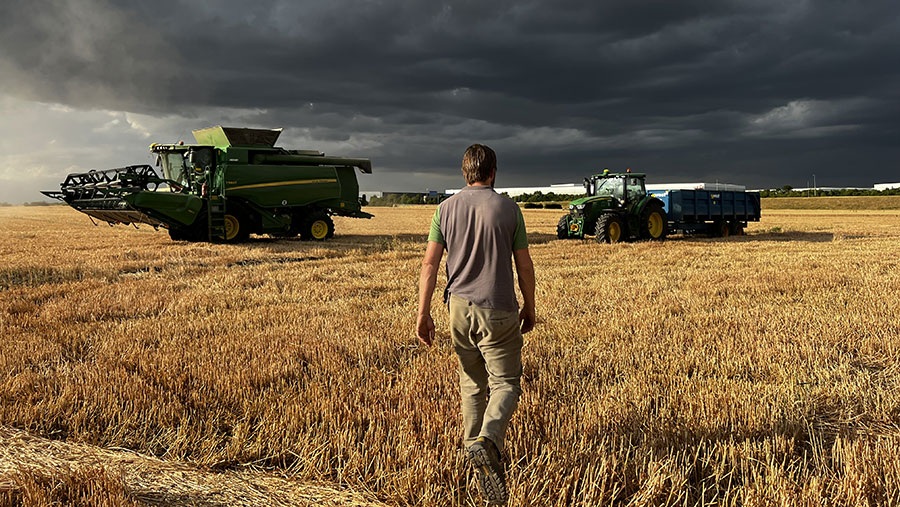 Tom Martin in field with combine