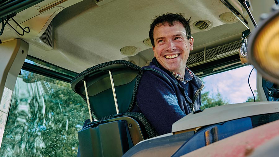 Oliver Scott in tractor cab