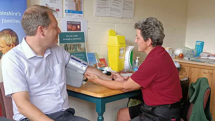 patients blood pressure being taken