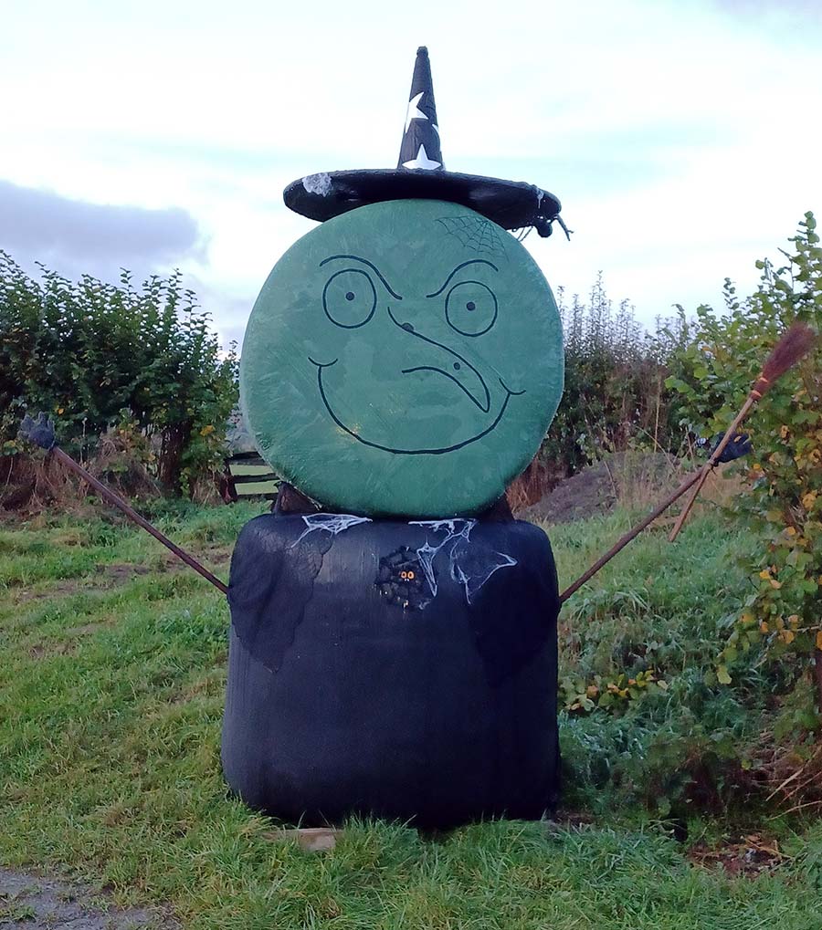 Halloween witch made of bales