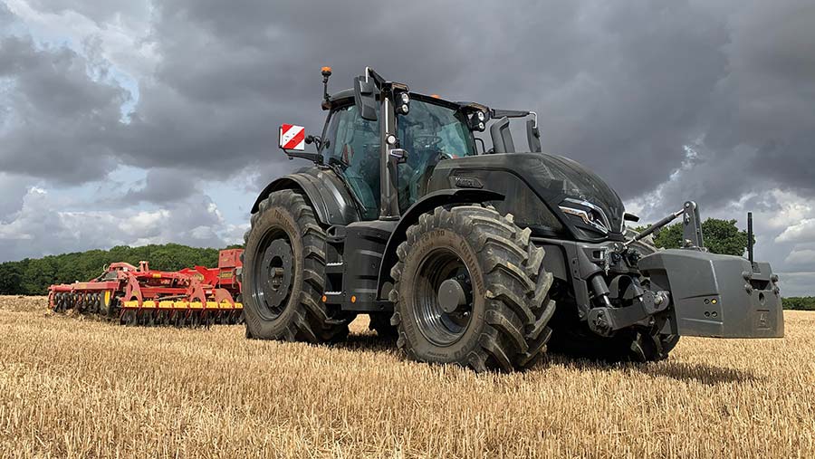 Tractor drilling into stubble