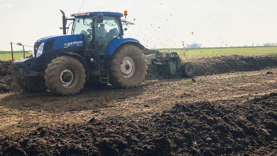 turning cattle compost