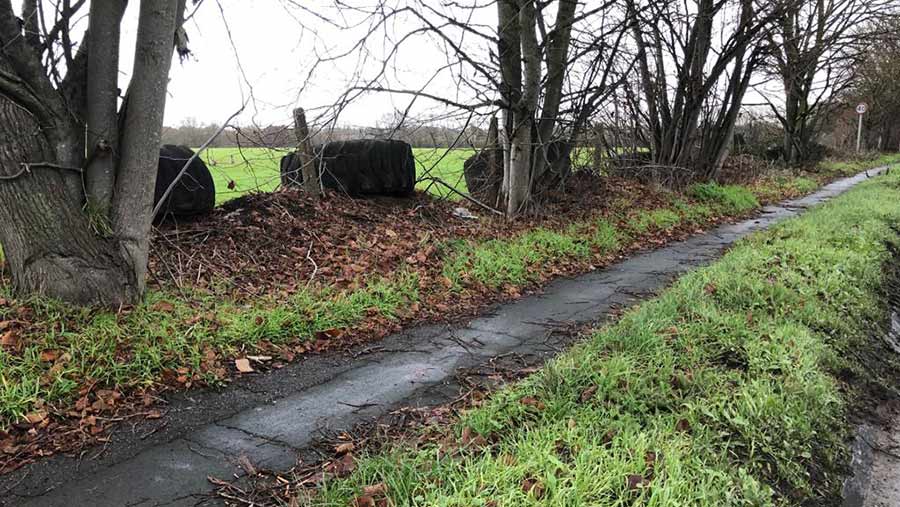 Tractor tyres near fencing