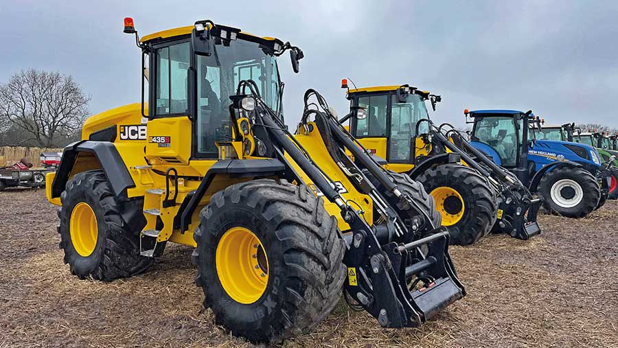 Loading shovel at auction sale