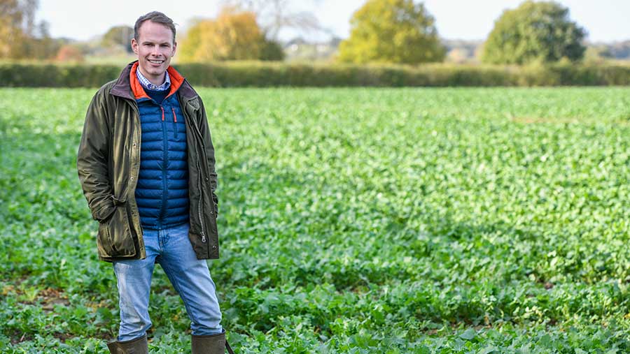 Rob Scott standing in a field