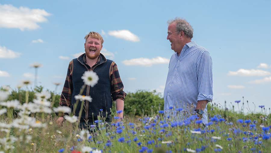 Kaleb Cooper and Jeremy Clarkson in field