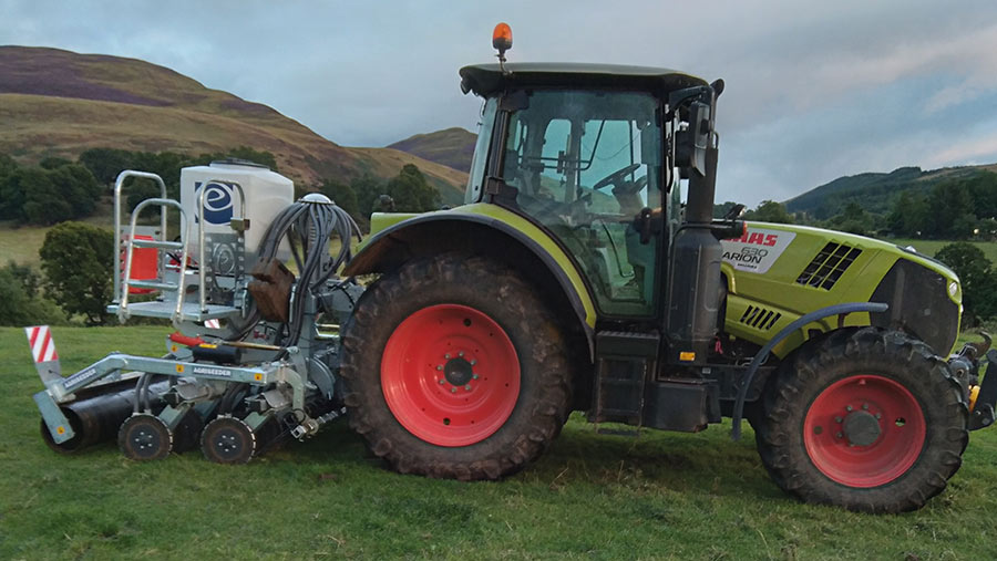 agriseeder attached to tractor