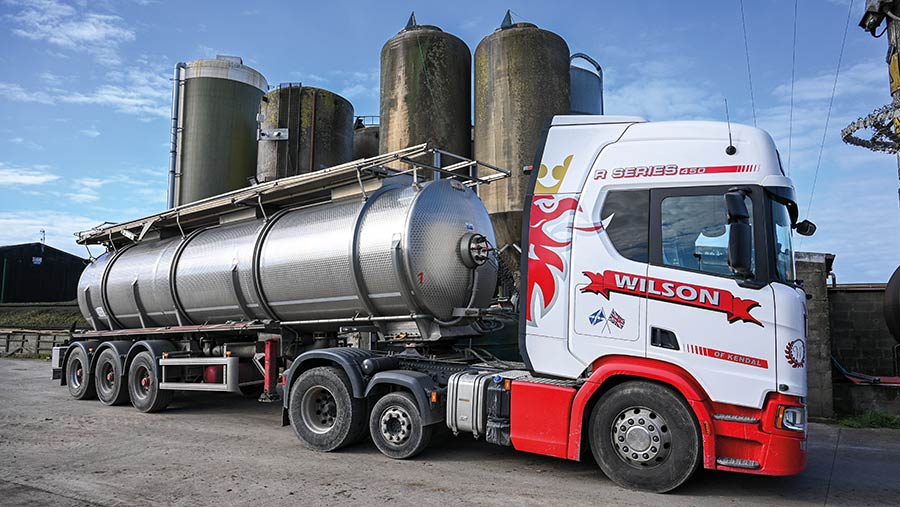 Tanker lorry in front of feed silos