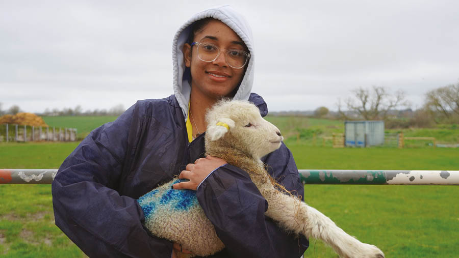 Student with lamb