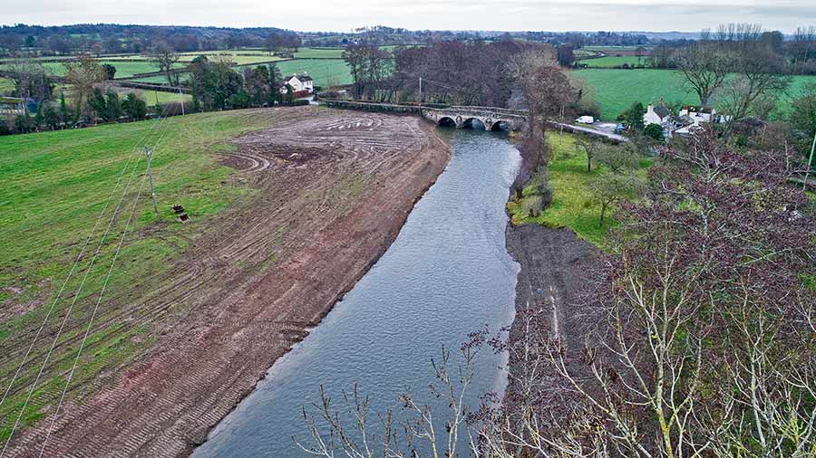 Aerial view of damaged river bank