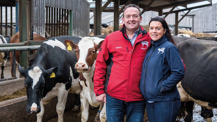 Tom and Karen Halton in cow shed