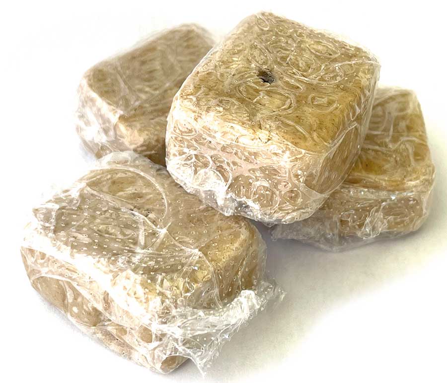 Blocks of paste shrink-wrapped in plastic