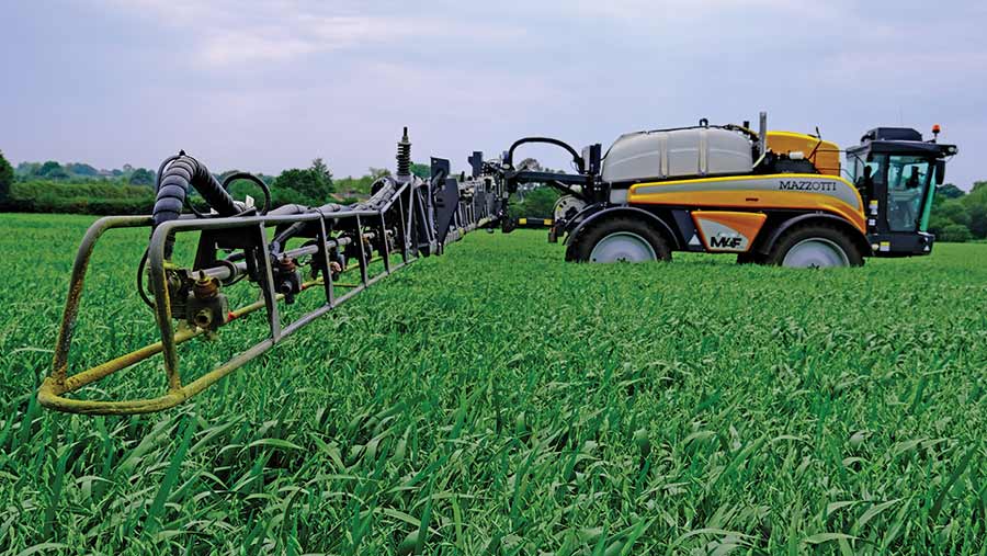 Side view of sprayer in a crop