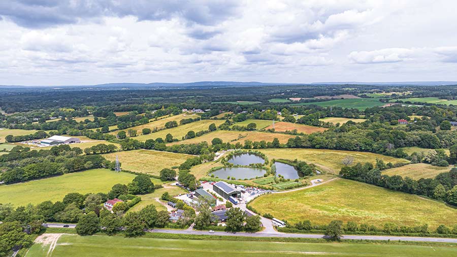 Aerial view of Stonehouse Farm set amongst countryside