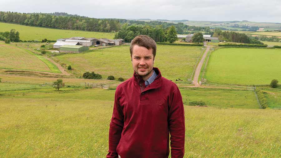 Man in a field with panoramic views