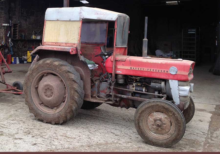 Old tractor in a farmyard