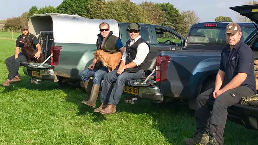 The Brinklow brothers sat on their trucks.