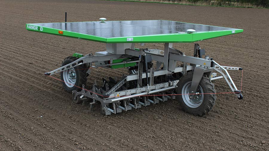 FarmDroid Seed and Weed autonomous hoeing machine in a field