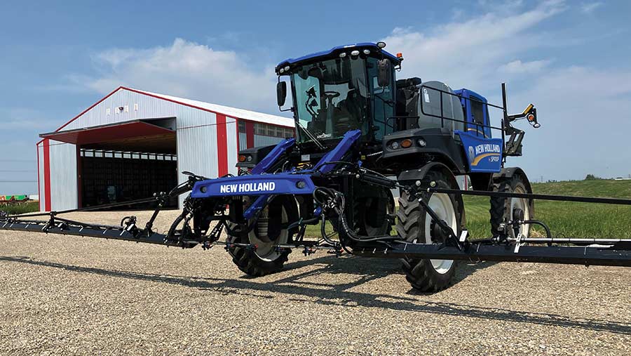 The McAllister's New Holland sprayer in the yard