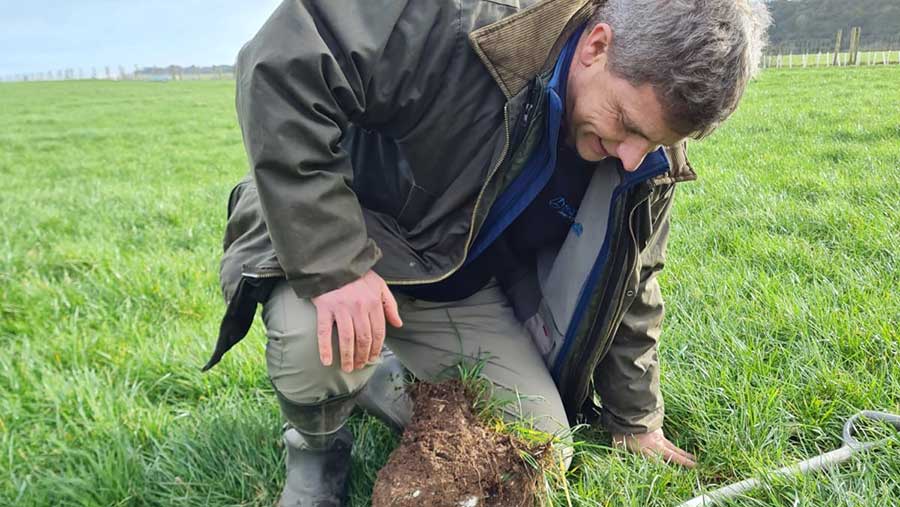 David Newton digging in field