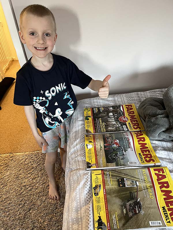 Jack with FW magazines spread out on his bed
