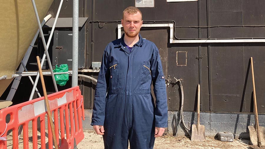Man standing outside in a boiler suit