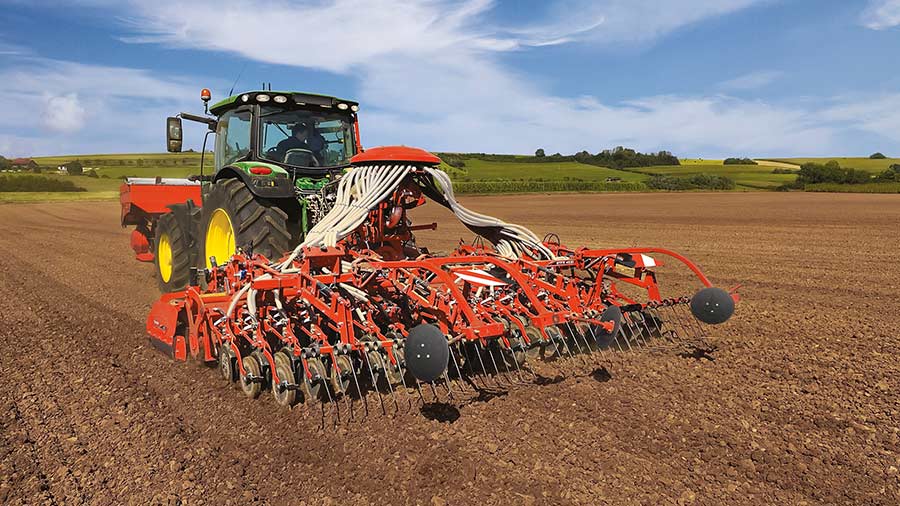 Power harrow and maize planter in a field