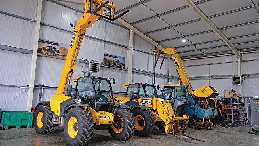 Telehandlers in workshop