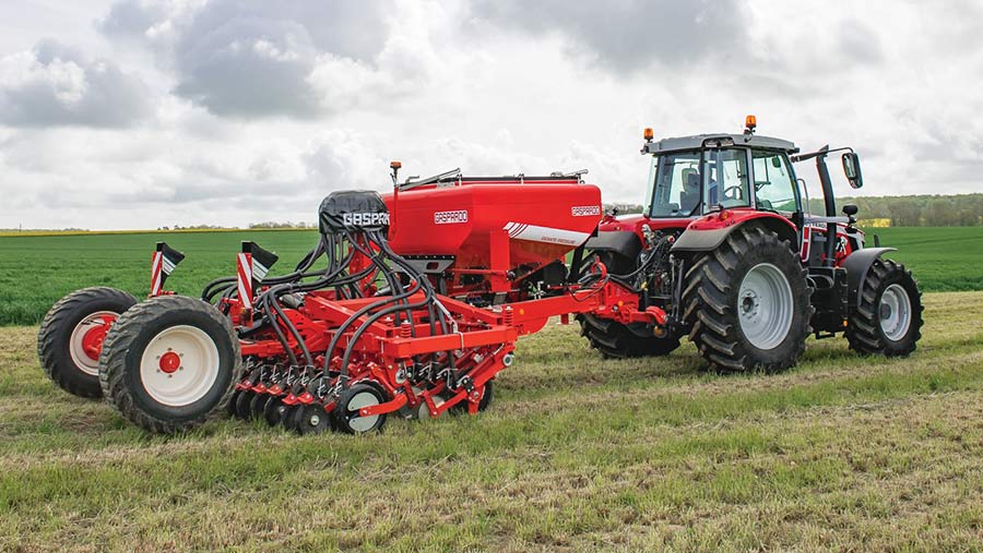 Gigante Pressure disc coulter drill with tractor in field