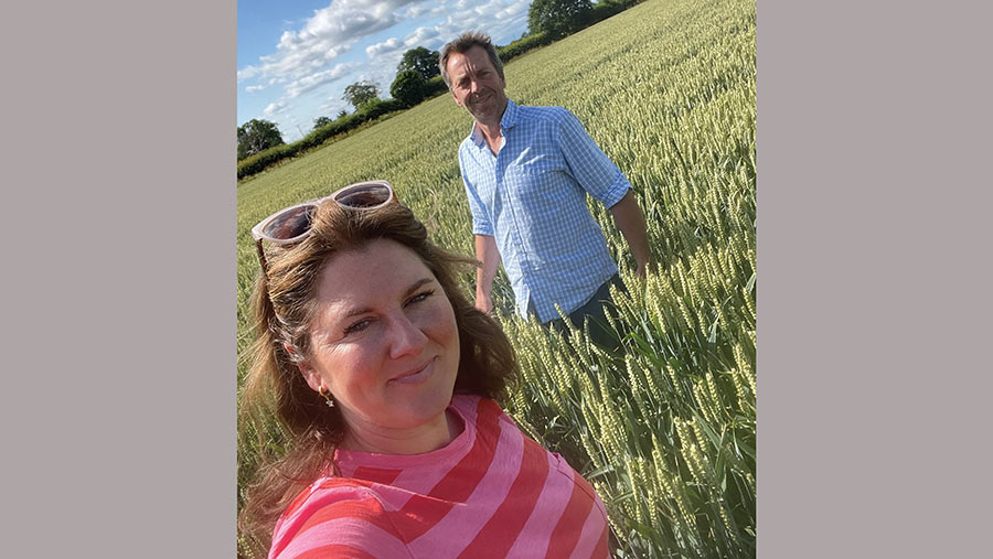 Couple in a field of wheat