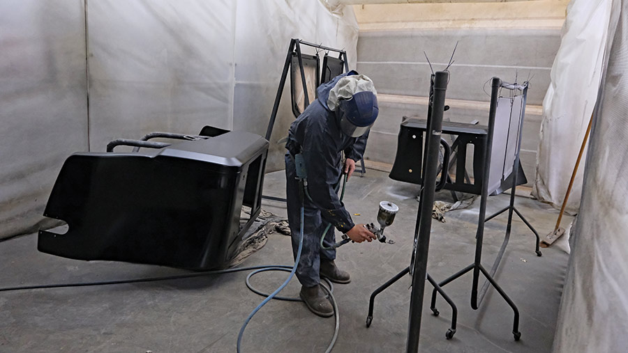 Man spraying in a spray booth