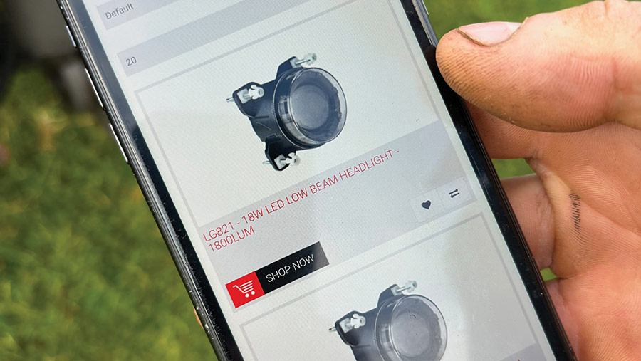 Replacement headlights being purchased online on a smartphone