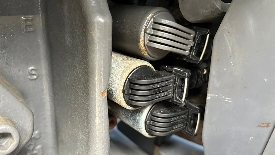 Close-up of solenoids on a tractor