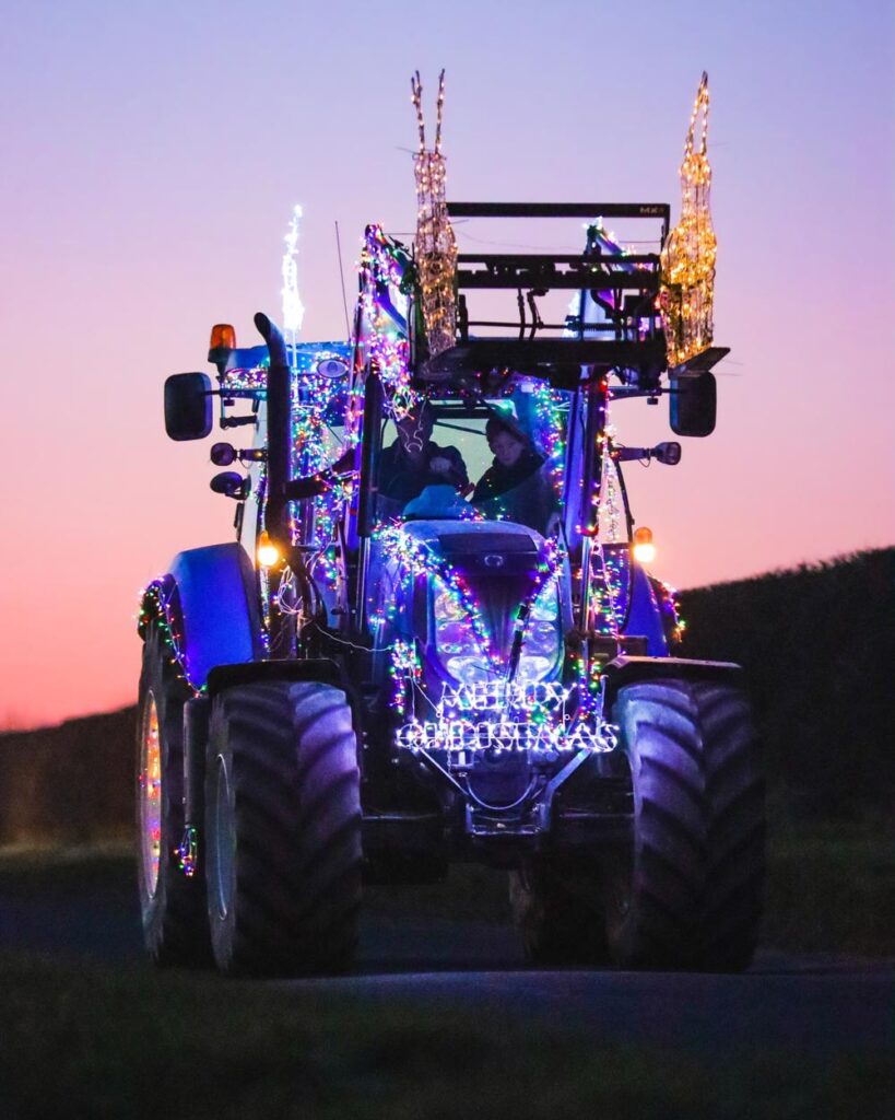 Tractor with Christmas lights at Yorkshire Wolds Farmer Christmas Festive Tractor Run