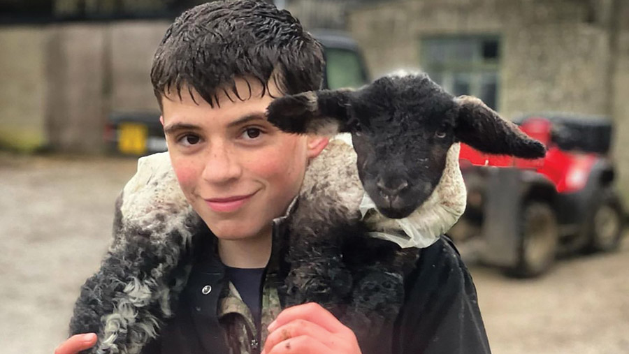 Young boy (Hugh) with lamb