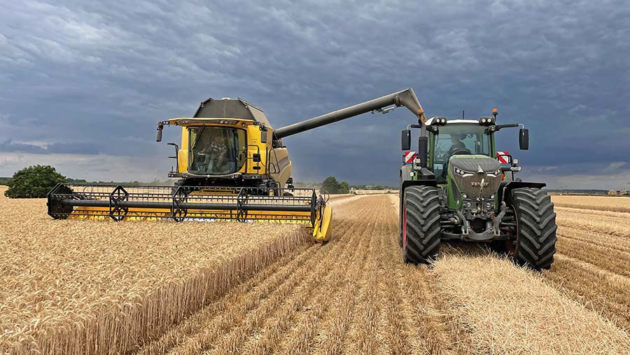 Combine harvester and tractor