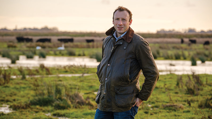 Rob Raven standing in field