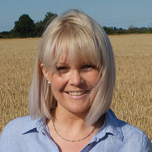 Heather Oldfield in a wheat field