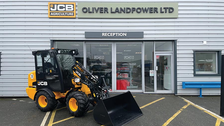 JCB tractor parked outside a machinery dealership
