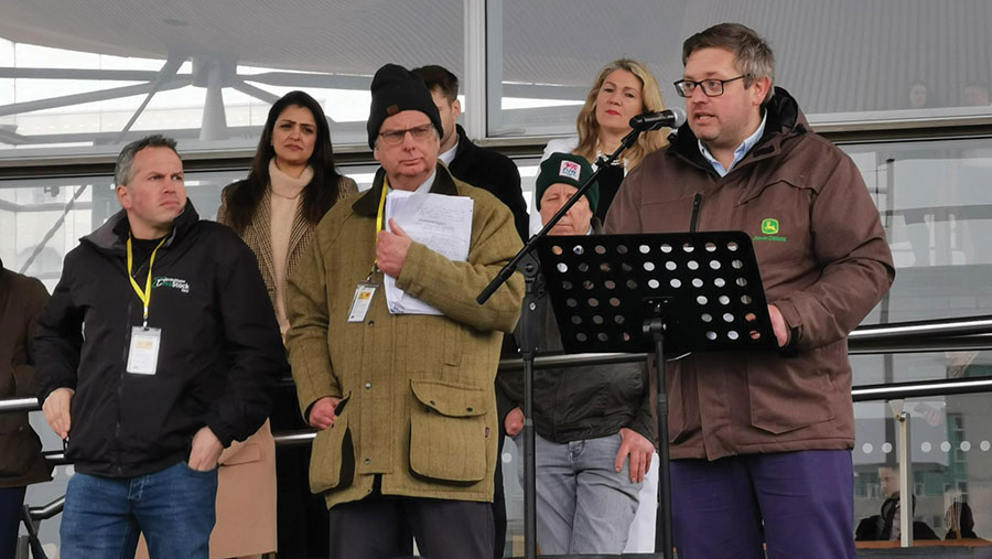 Stuart Williams addresses protestors in Cardiff