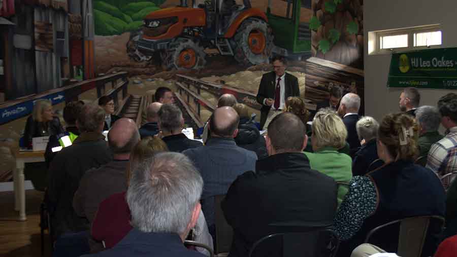 A meeting room filled with people