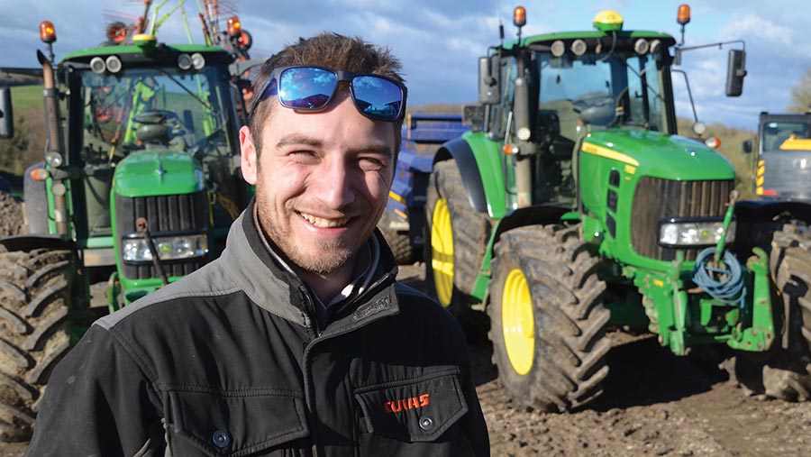 Jack Dowding in front of tractor