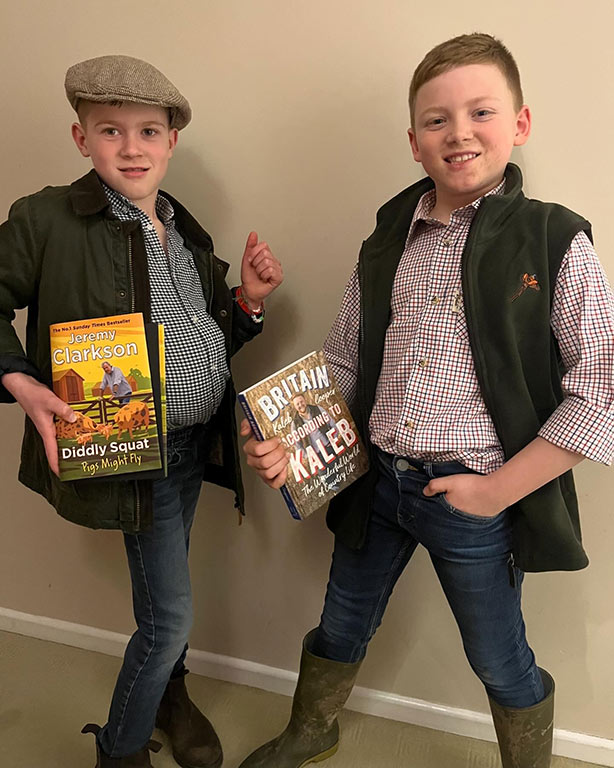 Two young boys dressed as farmers