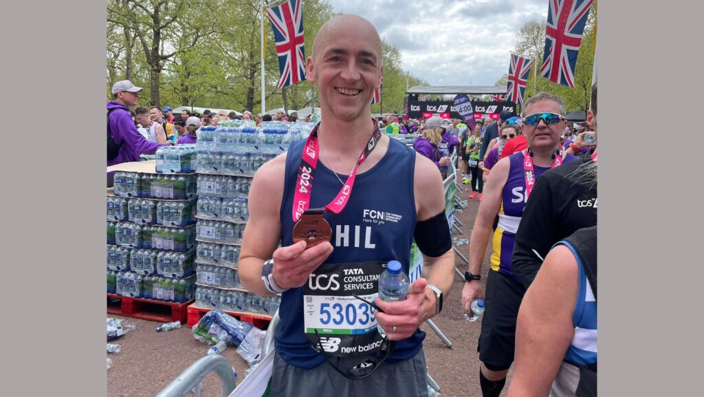 Philip Case with his London Marathon medal