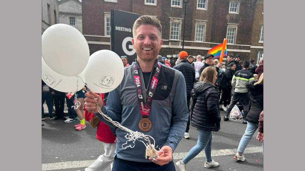 Edd Mowbray at the London Marathon with finisher's medal 2024