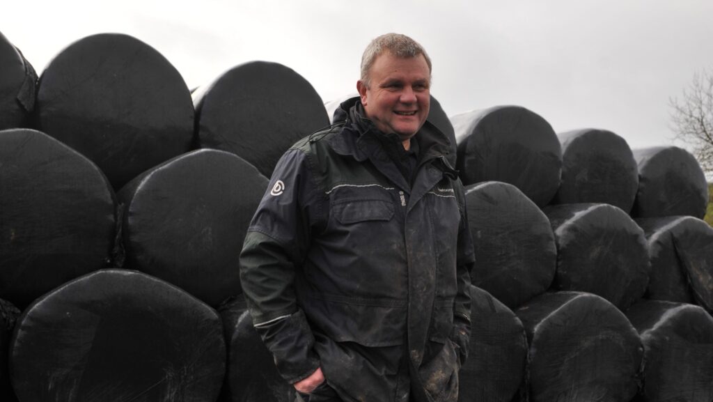 Martin Griffiths with silage bales