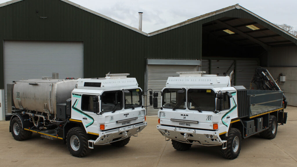 The twin former military trucks used by AT Bone for on-farm logistics © Peter Hill