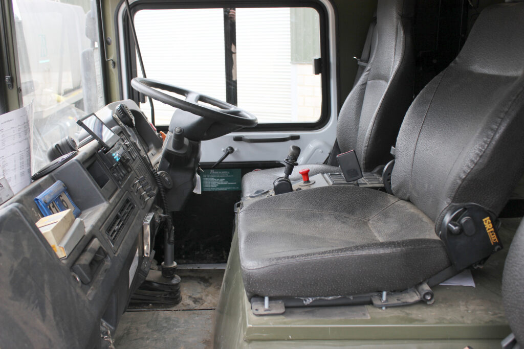 Seating in a the full-width truck cab