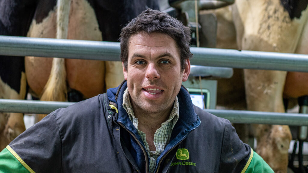Dave Eardley in milking parlour