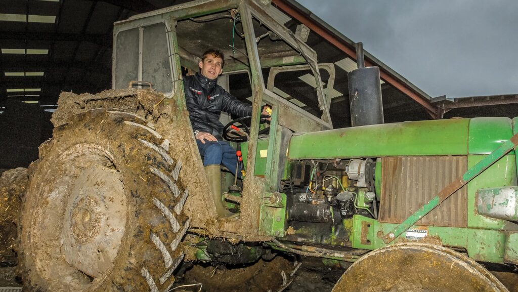 Harry Cobden driving a tractor